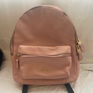 Pink leather coach backpack